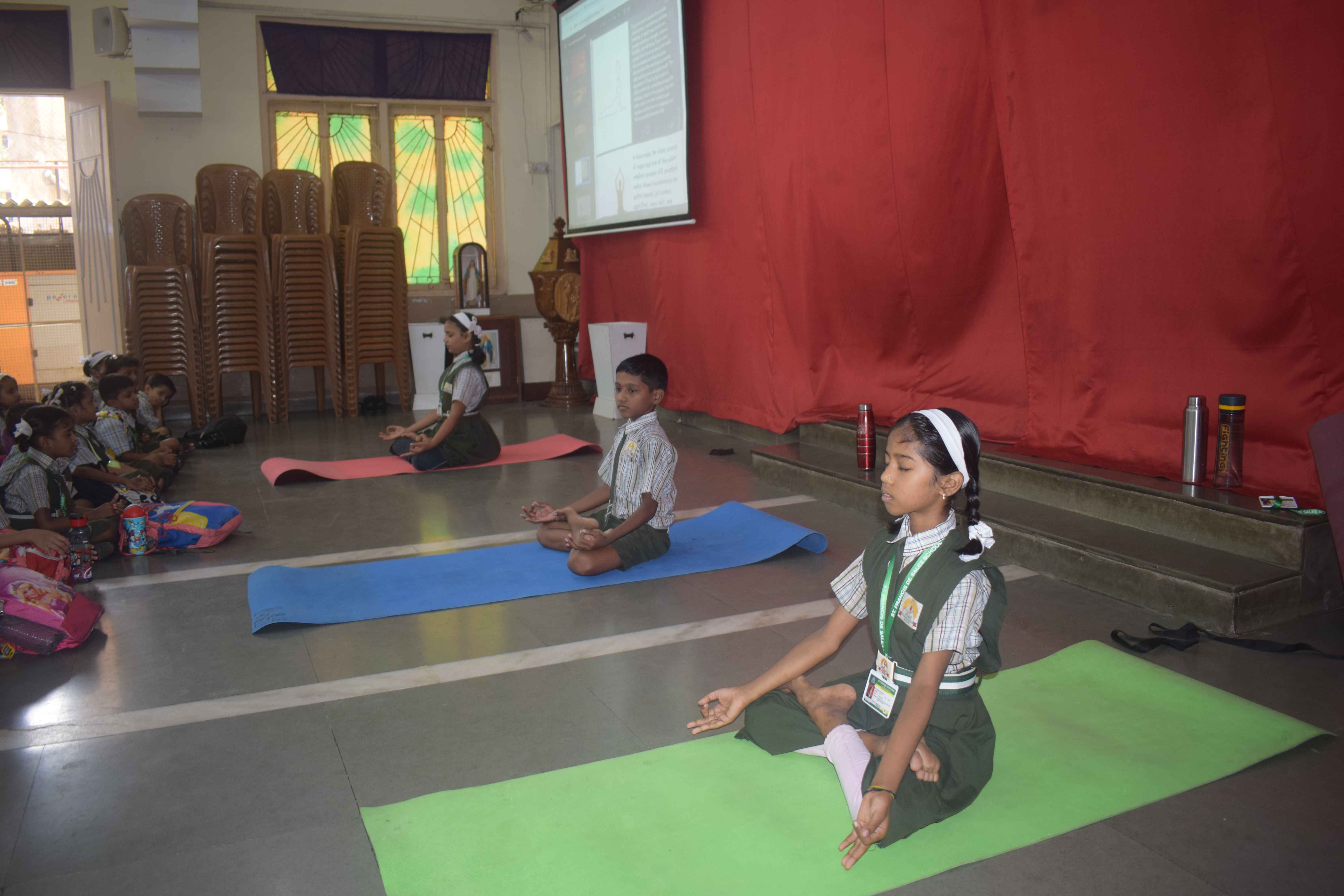 Child doing seated meditation